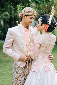 Smiling couple during wedding ceremony