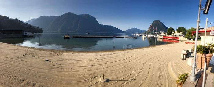 Panoramic view of beach against clear sky