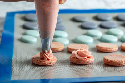 Low section of person standing on table