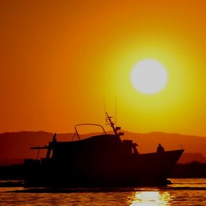 Scenic view of sunset over river