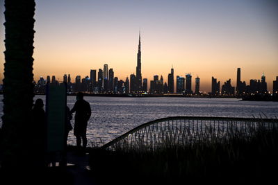 Dubai skyline from dubai creek harbour and dubai canal to downtown and business bay, uae