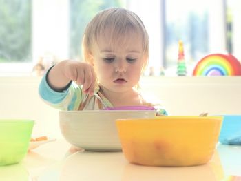 Portrait of cute girl having food