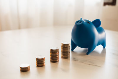 Close-up of coins on table