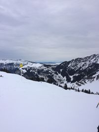 Snow covered mountain against sky