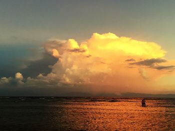 Scenic view of sea at sunset