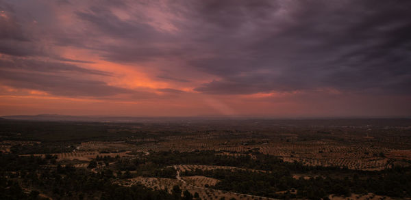 Aerial view of townscape against sky during sunset