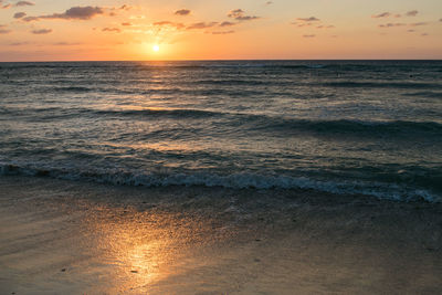 Scenic view of sea against sky during sunset
