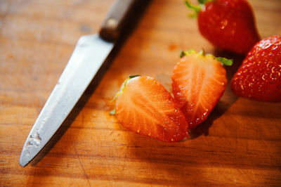 High angle view of chopped fruits on cutting board