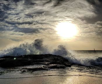 Scenic view of sea at sunset