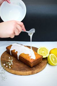 Midsection of person holding ice cream in plate