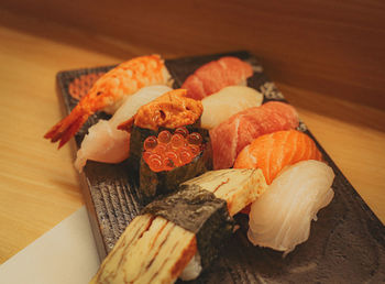 Close-up of sushi on cutting board