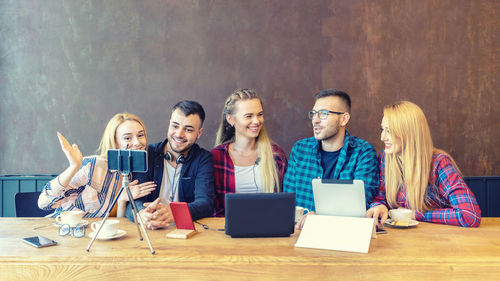 Group of people using smart phone