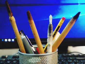 Close-up of colored pencils on table