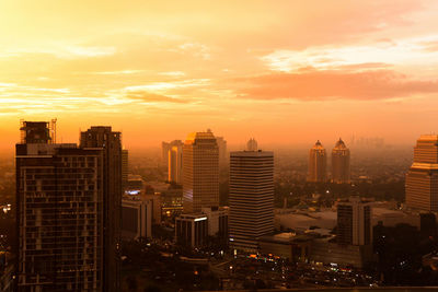 Cityscape of jakarta against sky during sunset, jakarta