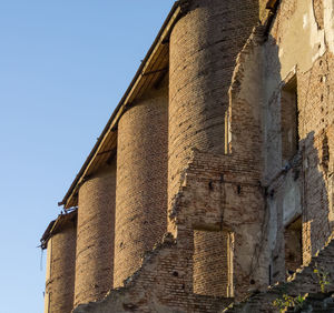 Low angle view of old building against sky
