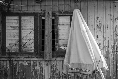 Abandoned building seen through broken window