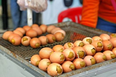 Close-up of pumpkins for sale at market stall