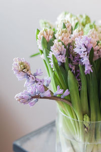 Close-up of pink flower vase on table