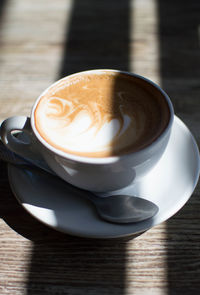 Close-up of cappuccino on table