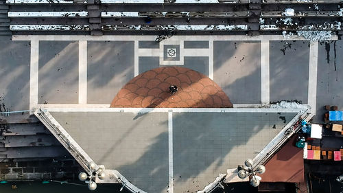 High angle view of buildings by city