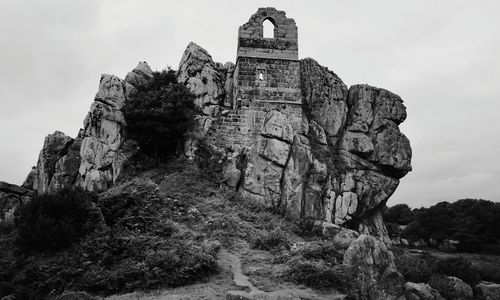 Low angle view of old building against sky