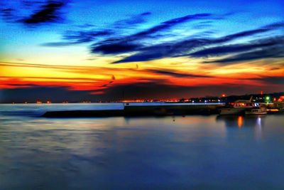 Scenic view of sea at sunset