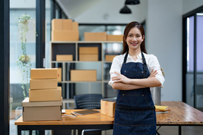 Portrait of young woman using mobile phone