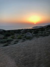 Scenic view of landscape against sky during sunset