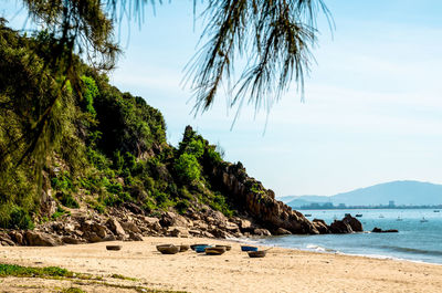 Scenic view of beach against sky