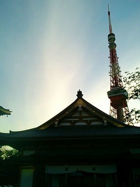 low angle view, architecture, built structure, building exterior, sky, religion, place of worship, spirituality, high section, church, roof, temple - building, outdoors, day, no people, history, cloud - sky, tower, dome