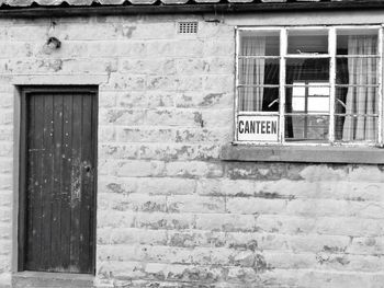 Text on window of building