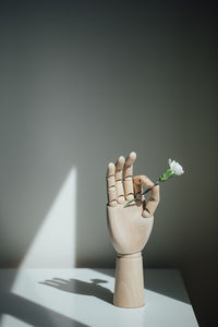 Close-up of white flower vase on table