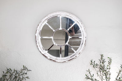 Round mirror on wall 