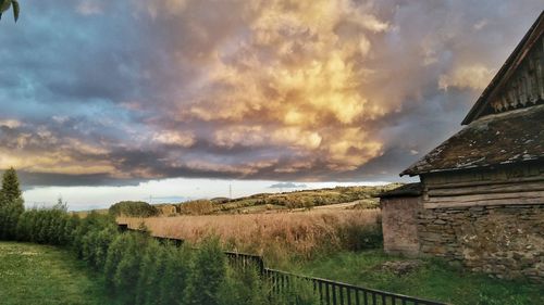 View of landscape against cloudy sky