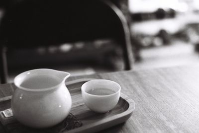 Close-up of coffee cup on table