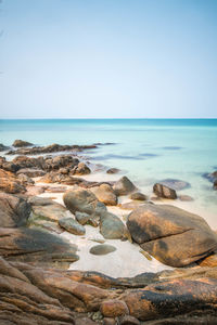 Scenic view of beach against clear sky