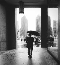 Full length of woman walking in city