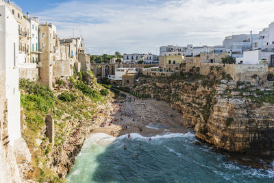 Rough and breathtaking sea. polignano a mare sunlit. puglia. italy