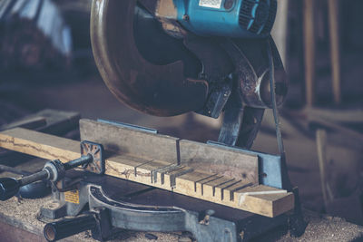 Close-up of old machine in workshop