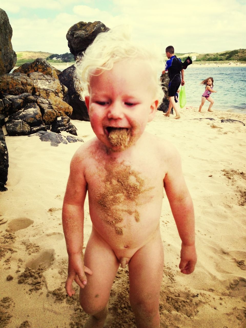 beach, sand, water, shore, childhood, sea, leisure activity, person, lifestyles, elementary age, boys, vacations, shirtless, full length, girls, togetherness, innocence, love