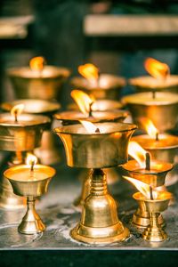 Close-up of burning candles