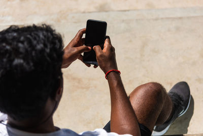 Man photographing with mobile phone