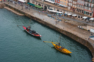 Boats moored in river