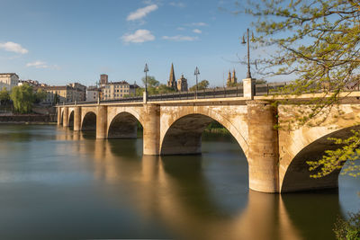 Arch bridge over river