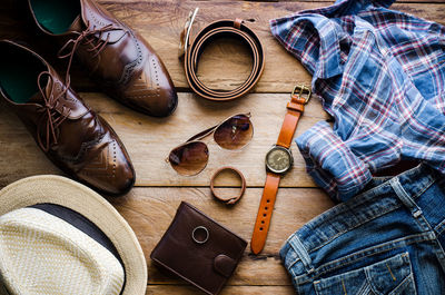 High angle view of personal accessories on table