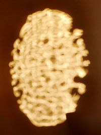 Close-up of illuminated light bulb