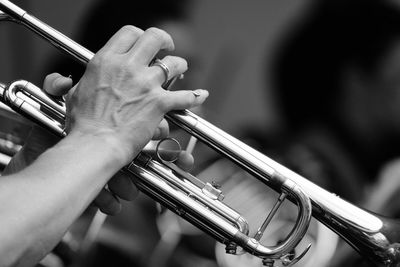 Close-up of man playing trumpet