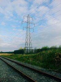 Electricity pylons on landscape