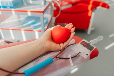 Young woman making blood donation in hospital. blood donation.