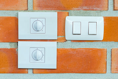 Close-up of power switchs on wall